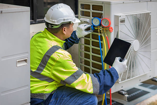 Professional Heat Pump Repair technician working in Rockdale, IL